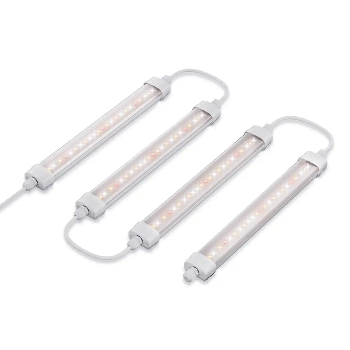 Vier weiße LED-Grow-Lichtröhren.