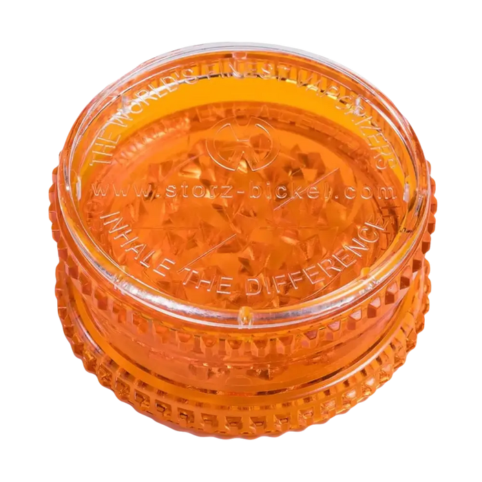 Orangefarbener transparenter Grinder.